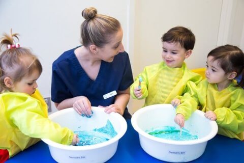 Children playing with slime at daycare
